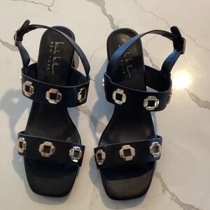 Elegant Black Sandals with Gold Accents